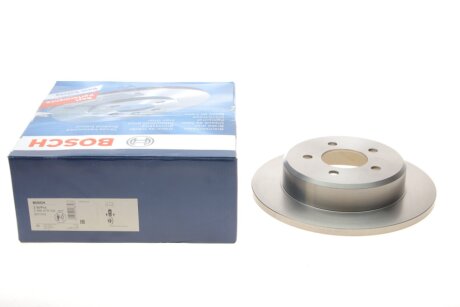 Диск гальмівний (задній) Dodge Caravan/Jeep Cherokee 95-08 (290x12.4) (повний) UA63 BOSCH 0 986 479 102