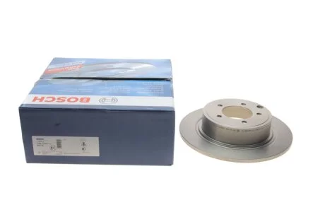 Диск гальмівний (задній) Mitsubishi Outlander 06-/Jeep Compass 06-/Patriot 07-17 (302.3x10) UA63 BOSCH 0 986 479 R07