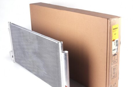 Радіатор кондиціонера Fiat Doblo/Opel Combo 1.3-2.0D 10- (opt-om) NRF 35940