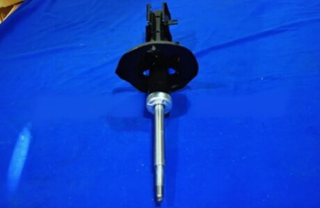 Амортизатор газомасляний CHEVROLET EPICA (KL1_) ПЕРЕД ЛЕВ PARTS-MALL PJC-FL007