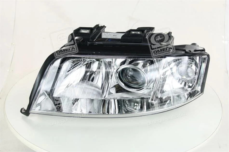 Фара левая Audi A6 (01-) H7/H7 TYC 20A406052B (фото 1)