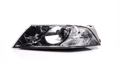 Фара лів. SK OCTAVIA 05-09 TYC 20-A670-05-2B