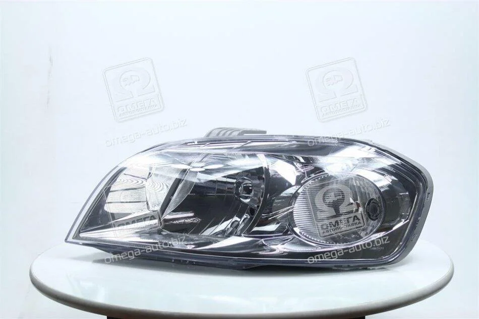 Фара ліва з моторчиком Chevrolet Aveo T250 (06-) седан (20-B082-A5-2B) TYC 20B082A52B (фото 1)